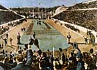 Φωτογραφία από τους Ολυμπιακούς αγώνες του 1896 στην Αθήνα. Ο Έλληνας μαραθωνοδρόμος Σπύρος Λούης τερματίζει πρώτος στο Παναθηναϊκό Στάδιο. 
